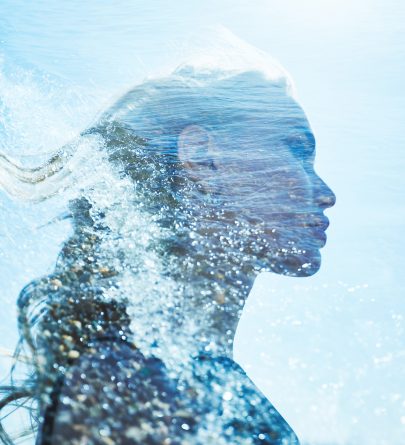 Abstract silhouette of a woman formed by flowing water and light, symbolizing ionized water in skincare and ORY’s science-driven hydration philosophy.