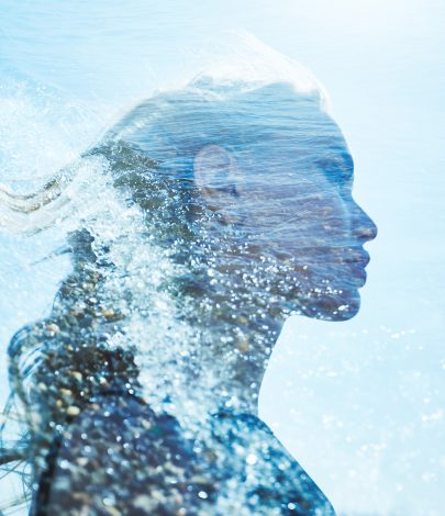 Abstract silhouette of a woman formed by flowing water and light, symbolizing ionized water in skincare and ORY’s science-driven hydration philosophy.