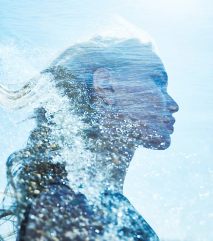 Abstract silhouette of a woman formed by flowing water and light, symbolizing ionized water in skincare and ORY’s science-driven hydration philosophy.
