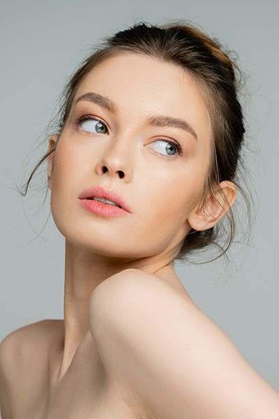 beauty_photoshoot_cleanser_dry_skin Woman with soft, hydrated complexion representing ORY Skincare cleanser for dry skin formulated to cleanse gently without stripping moisture.