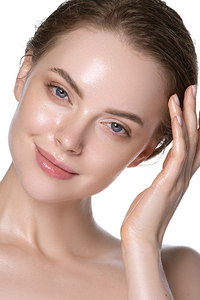 beauty_photoshoot_serum_oily_skin Woman with refreshed glowing complexion applying lightweight serum for oily skin — ORY Skincare mattifying and balancing serum.